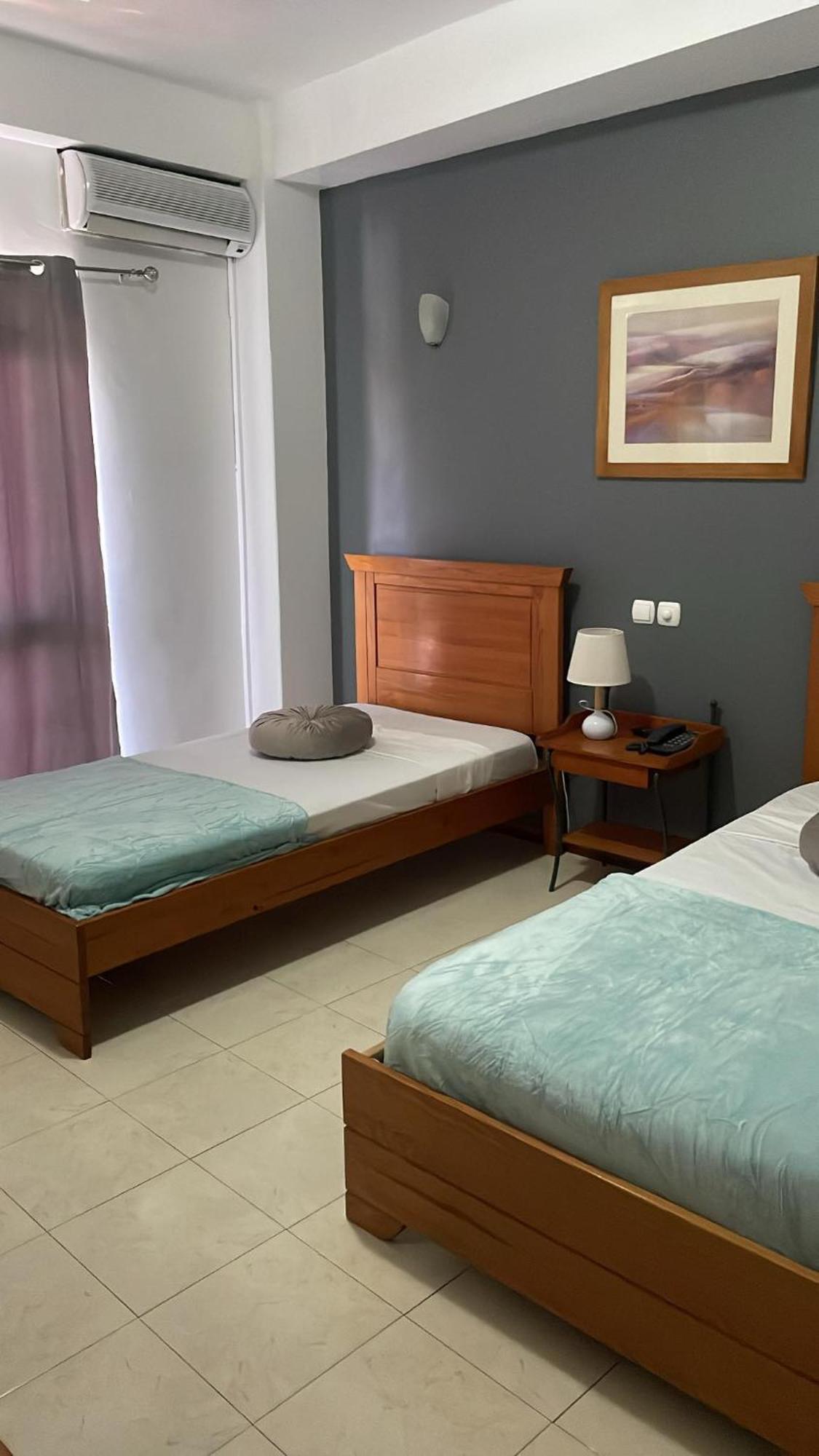 Felicidade Hotel Praia Luaran gambar